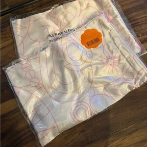 Pink and White Patterned silk Amika pillowcases